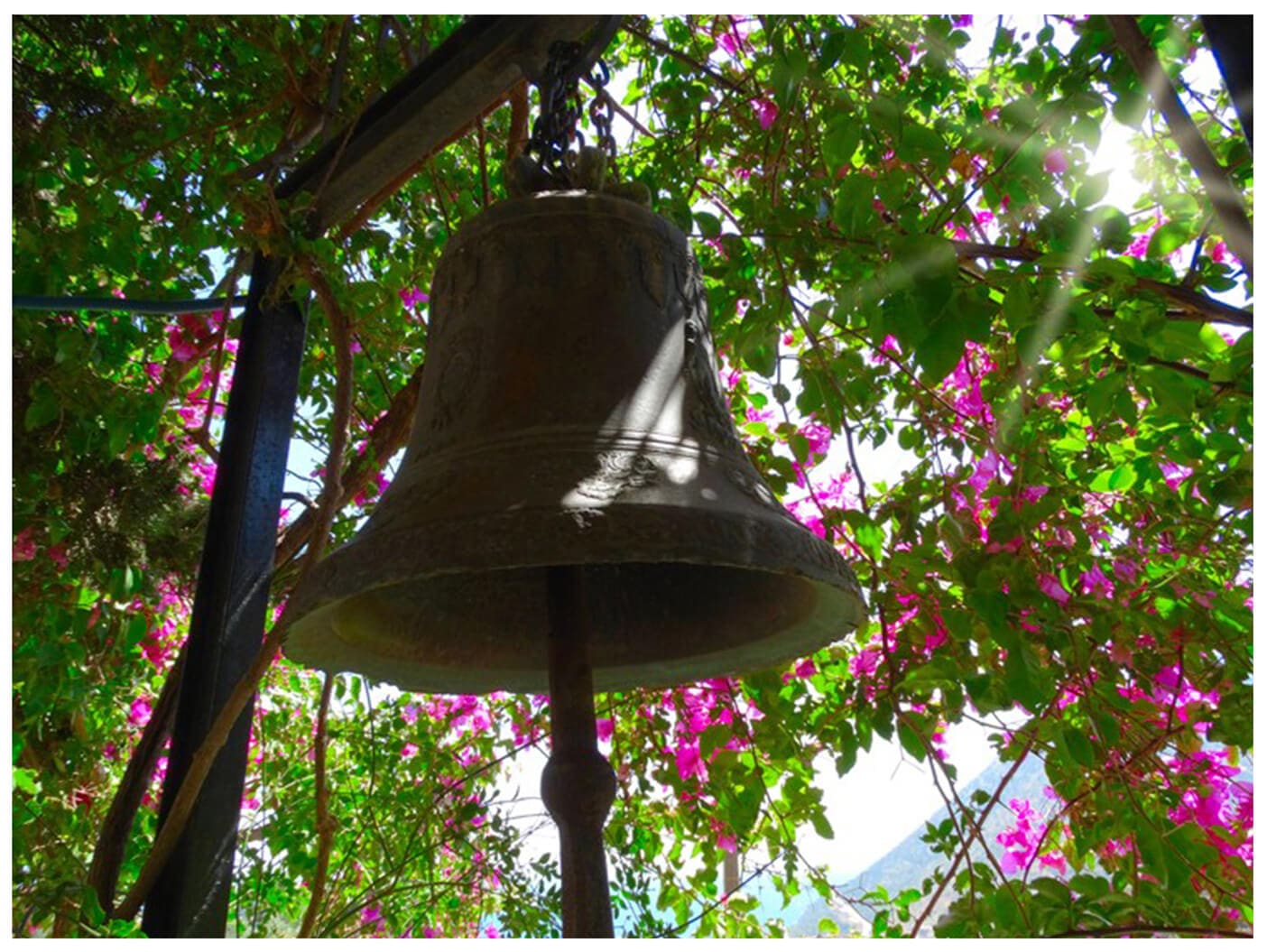 bell hanging in a tree